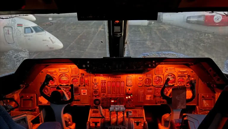 Aircraft cockpit with illuminated control panels