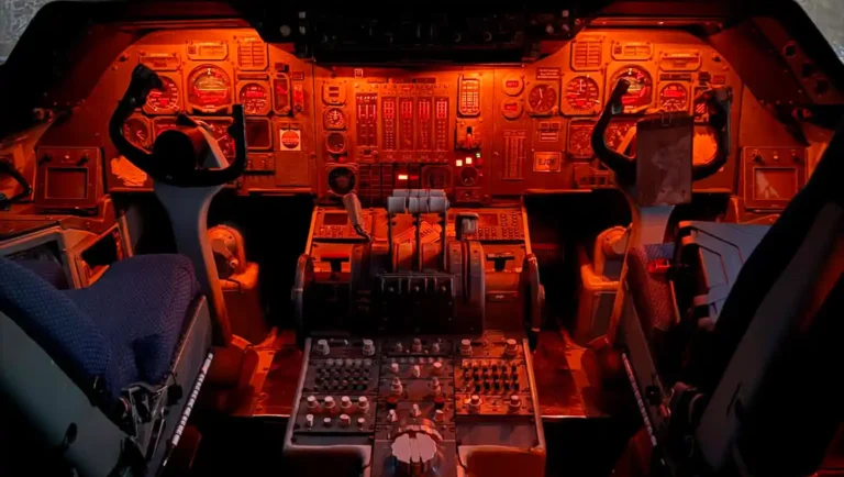 Aircraft cockpit with illuminated control panels